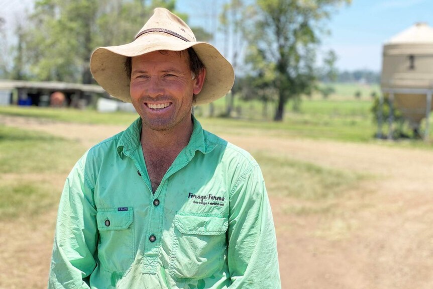 Forage Farms owner Stuart Andrews stands in a paddock.