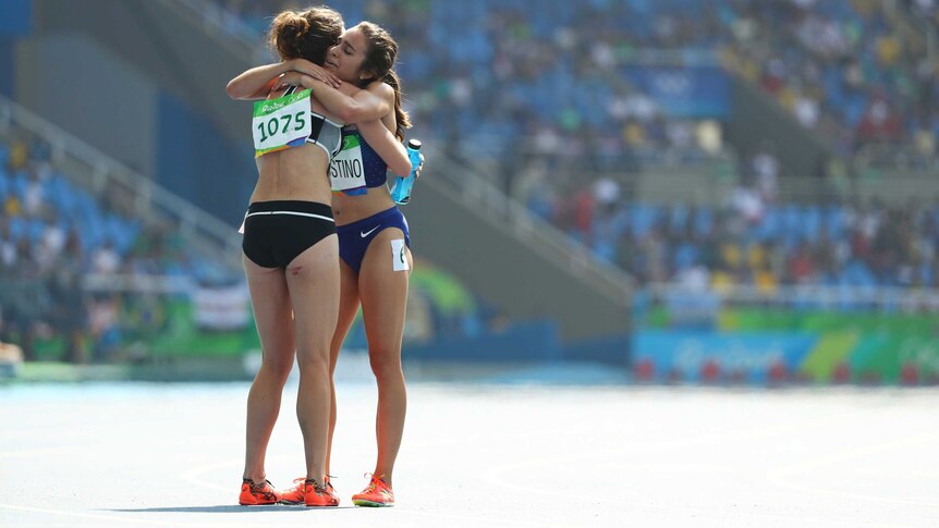 Hamblin and D'Agostino share an embrace on the track to the delight of spectators.