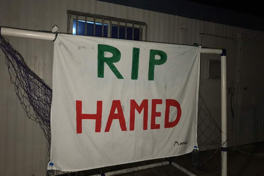 A red banner reads RIP Hamed inside the detention centre