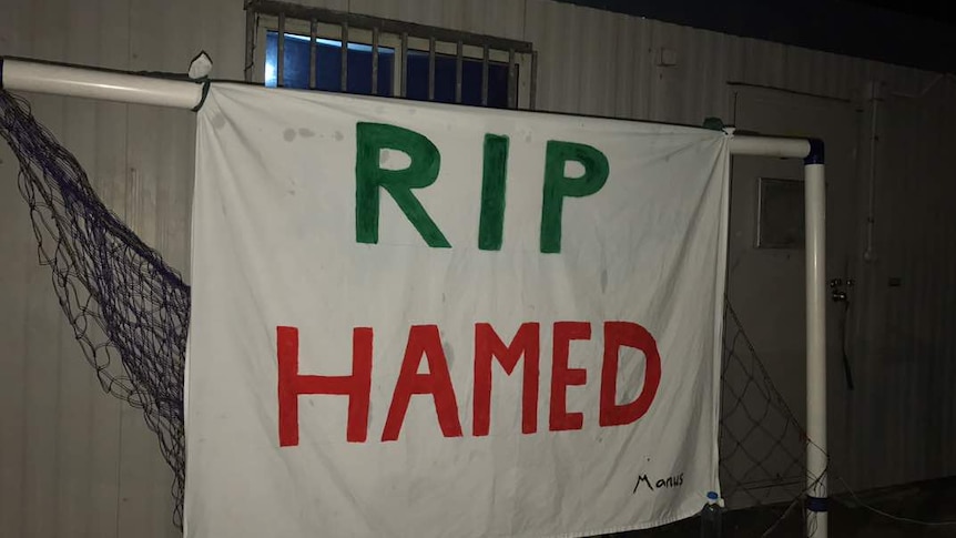 A red banner reads RIP Hamed inside the detention centre