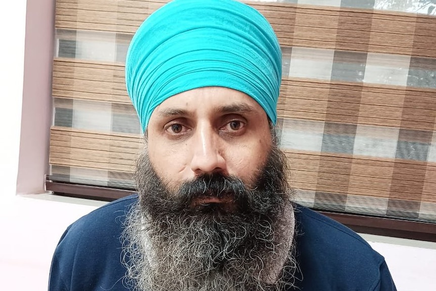 Rajwinder Singh with hands behind him after arrest over alleged murder of Toyah Cordingley