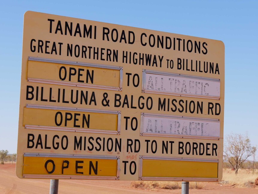 A road conditions sign at the start of the Tanami Road.