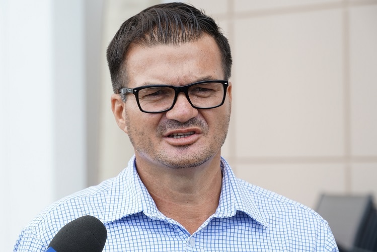 Ken Vowles speaks at a press conference at Parliament House in Darwin.