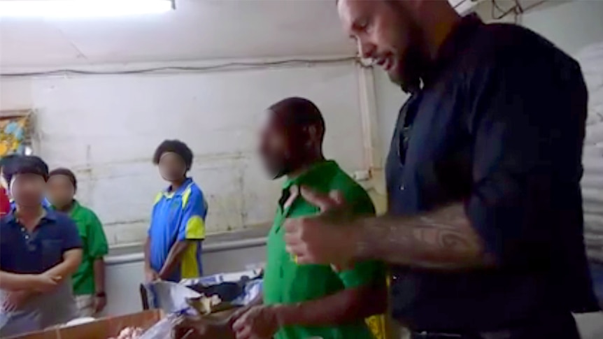 Oro Province Governor Gary Juffa inspects fast food outlet
