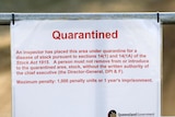 A quarantine sign sits at the entrance to a property at Cawarral