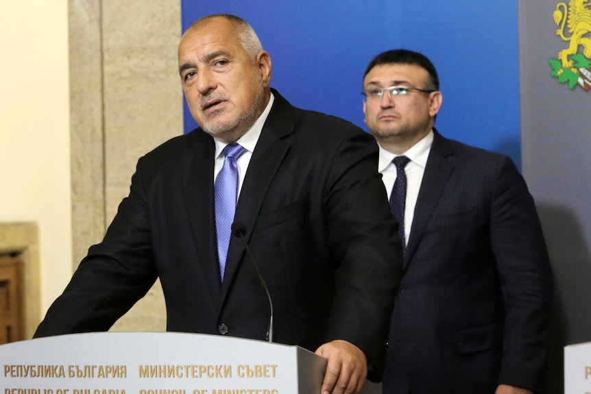Bulgaria's Prime Minister Boyko Borissov, left, speaks during a press conference with the Interior Minister
