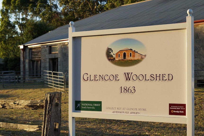 A sign reads "Glencoe Woolshed, 1863" out the front of the brick building.