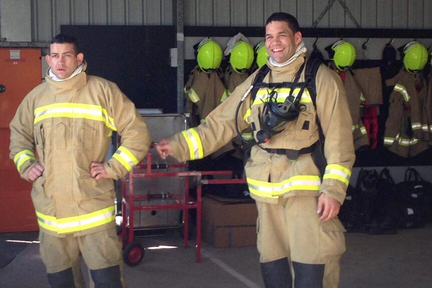 Michael Lett (left) and Peter Jensen (right) taking a break after fire fighting training.