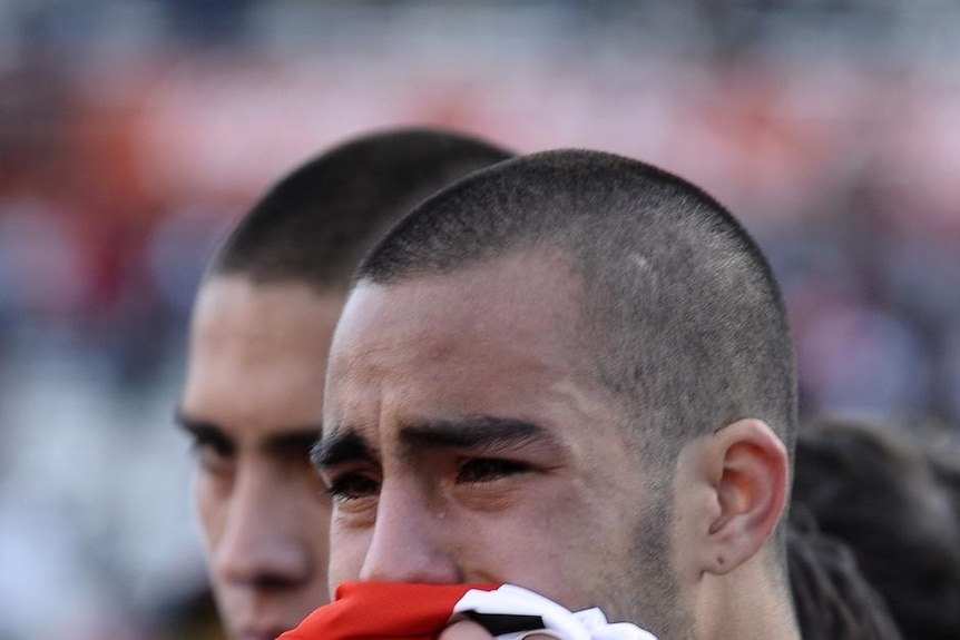 River Plate players weep after the club was relegated for the first time in its history.