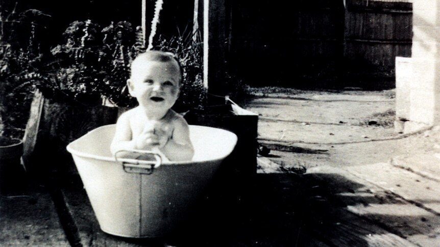 Bob Hawke, born December 9, 1929, pictured in a tin bath in the backyard of his Bordertown home in South Australia.