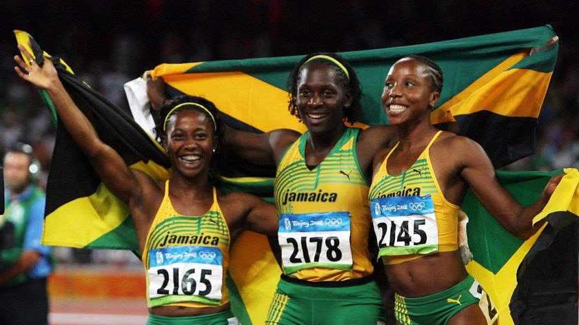 Gold medalist Shelly-Ann Fraser and joint silver medalists Kerron Stewart and Sherone Simpson