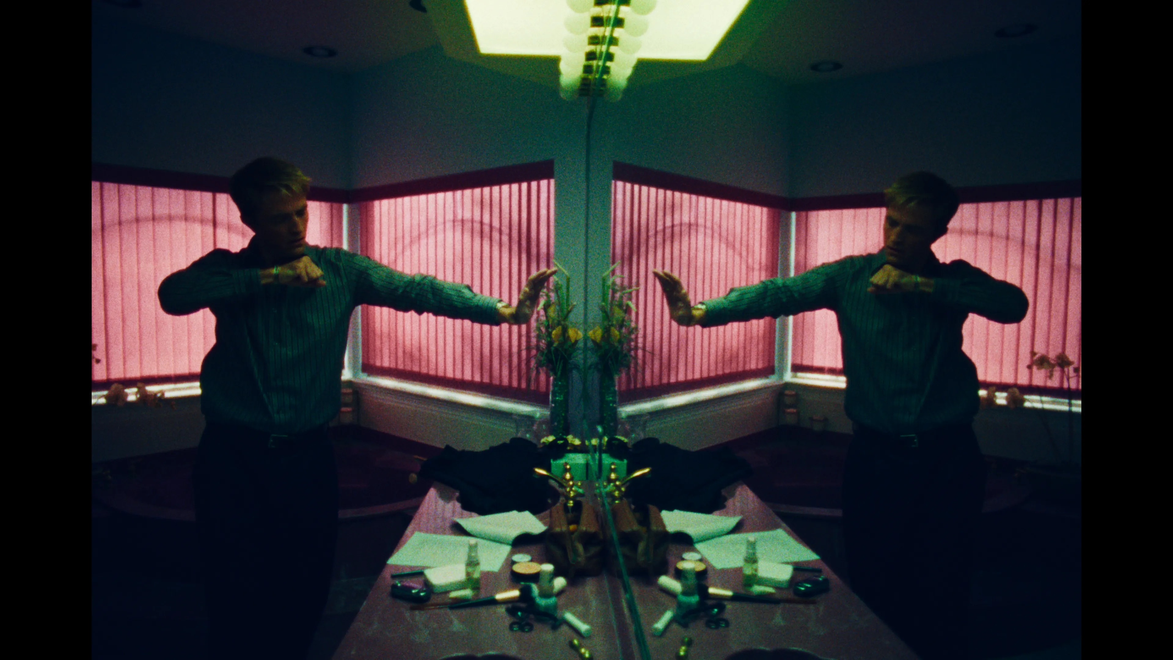a man dances in the mirror