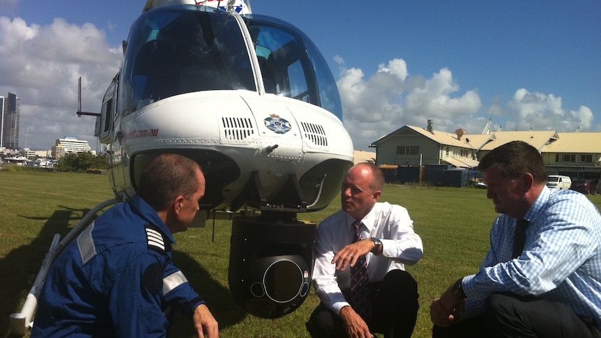 Campbell Newman speaks to police helicopter pilots on the Gold coast
