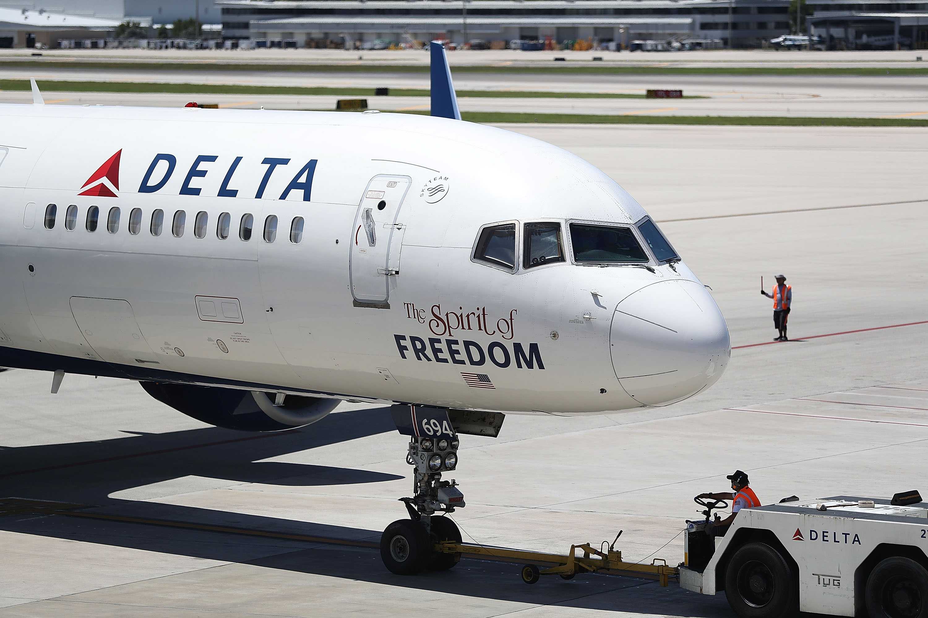 A Delta airlines plane is seen on the tarmac of the Fort Lauderdale-Hollywood International Airport on July 14, 2016
