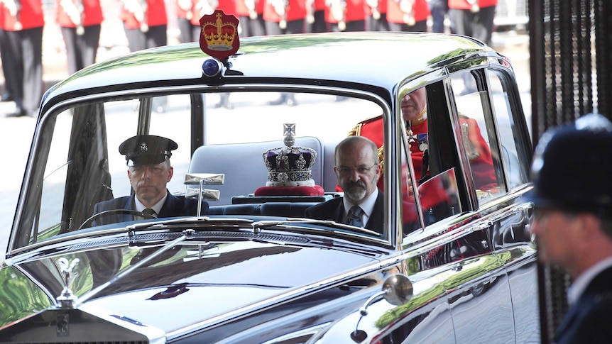 Imperial State Crown arrives in a car ahead of the state opening of Parliament