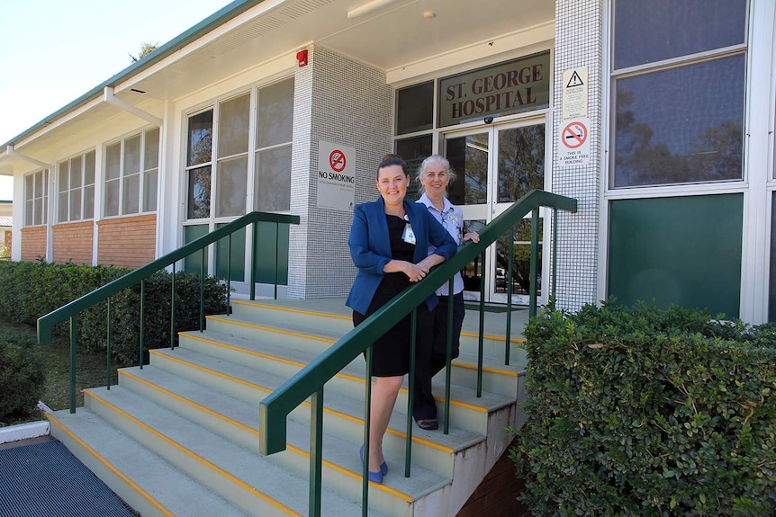 Amy Byrne (on left) and Donna Rixon, who works at St George Hospital, on steps outside the hospital.