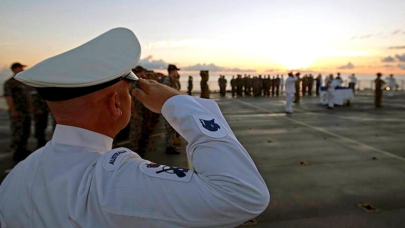 2013 Anzac Day commemoration service held on board HMAS Choules off the coast of Queensland.