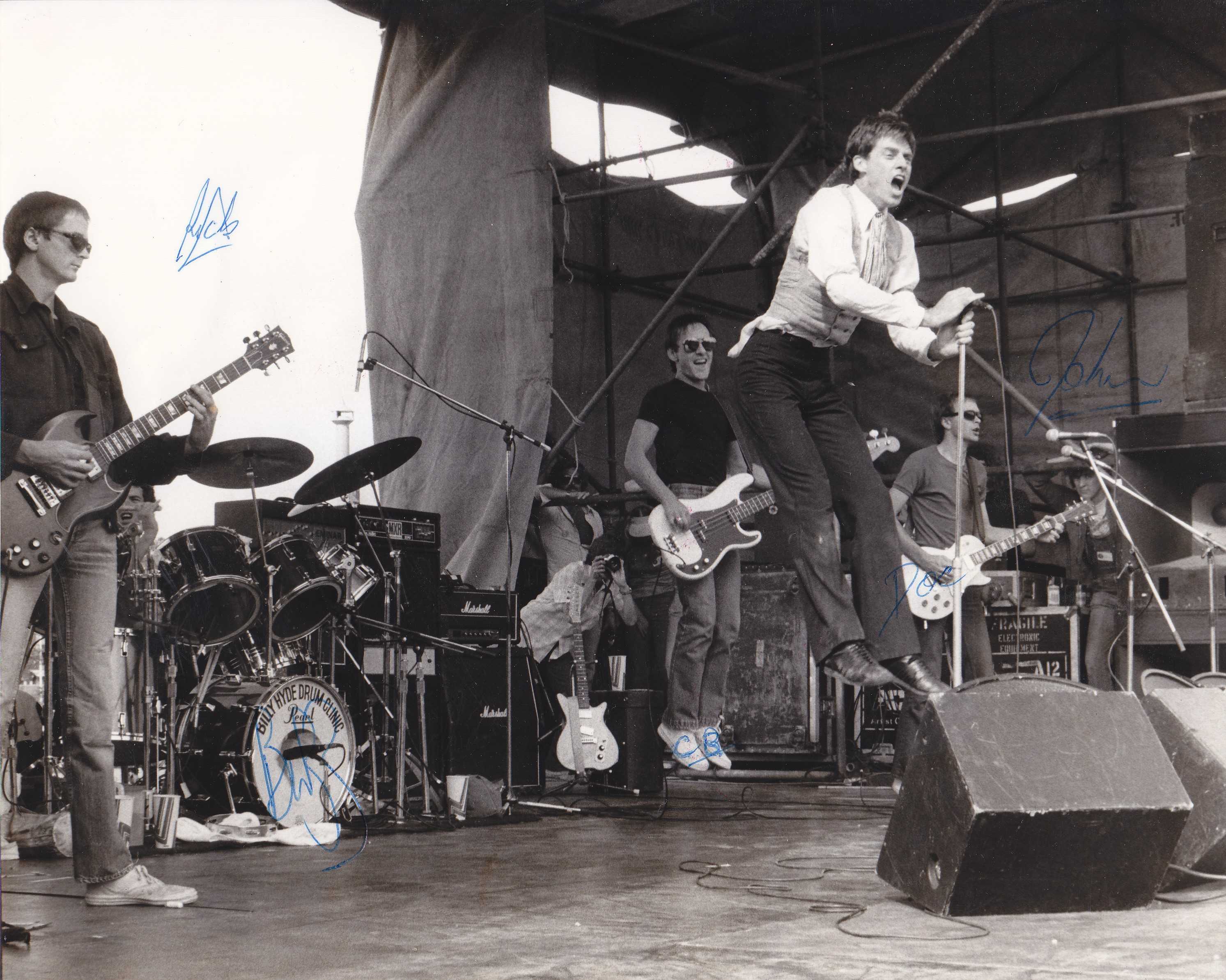 Doc Neeson in full flight on stage with The Angels