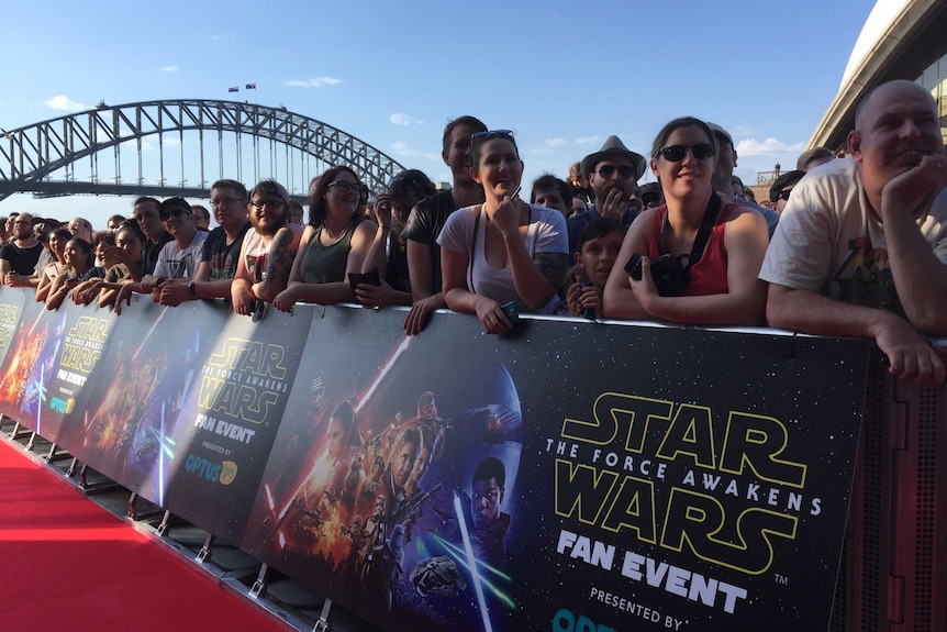 Star Wars fans line the red carpet at a fan event at the Sydney Opera House.