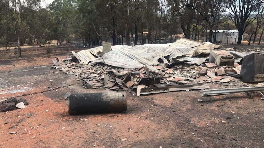 A house flattened by the fire