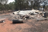 A house flattened by the fire