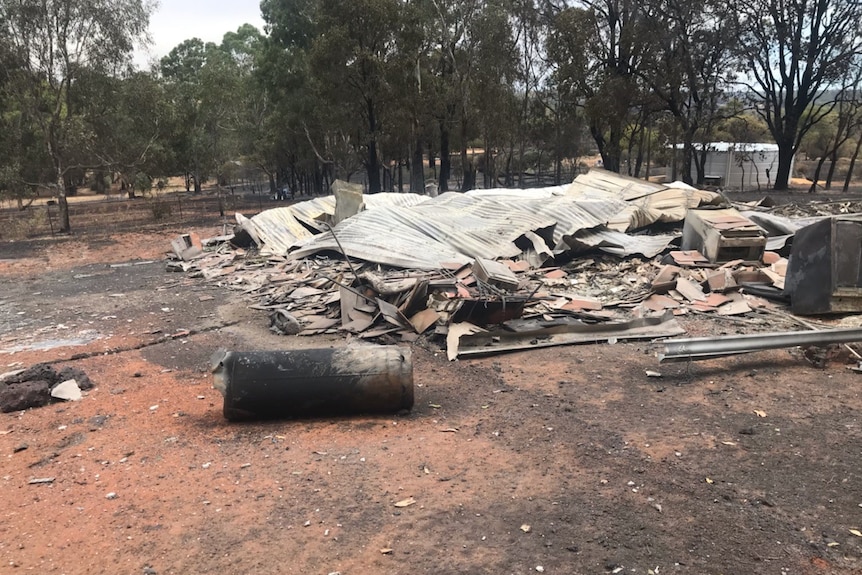 A house flattened by the fire