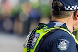 The back of a Victoria Police officer on duty.