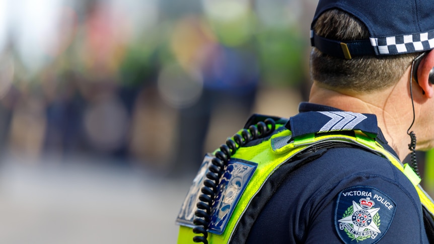 The back of a Victoria Police officer on duty.