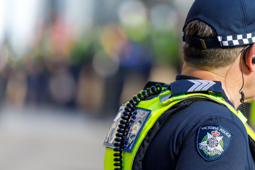 The back of a Victoria Police officer on duty.