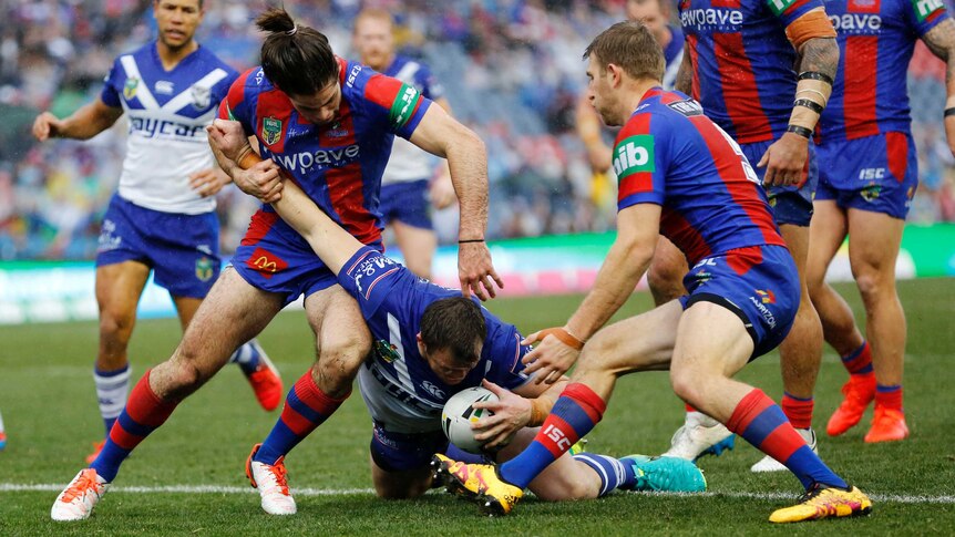 Josh Morris scores a try against Newcastle Knights