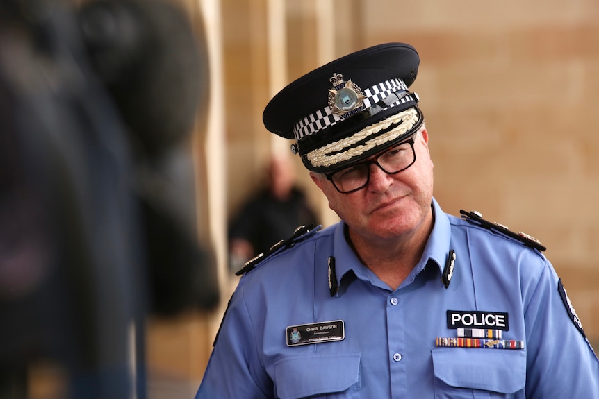 The WA Police Commissioner Chris Dawson, in uniform and hat, speaks at a media conference in Perth