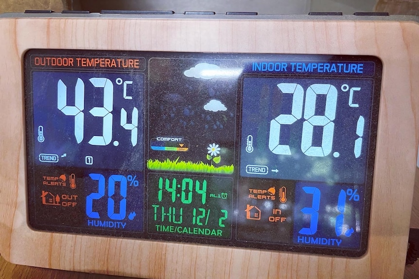 A digital weather station screen shows various readings including the temperature which is 43.4 degrees Celcius. 
