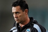 Cronulla coach Shane Flanagan looks on from the sidelines as the Sharks play the Roosters in June 2010.