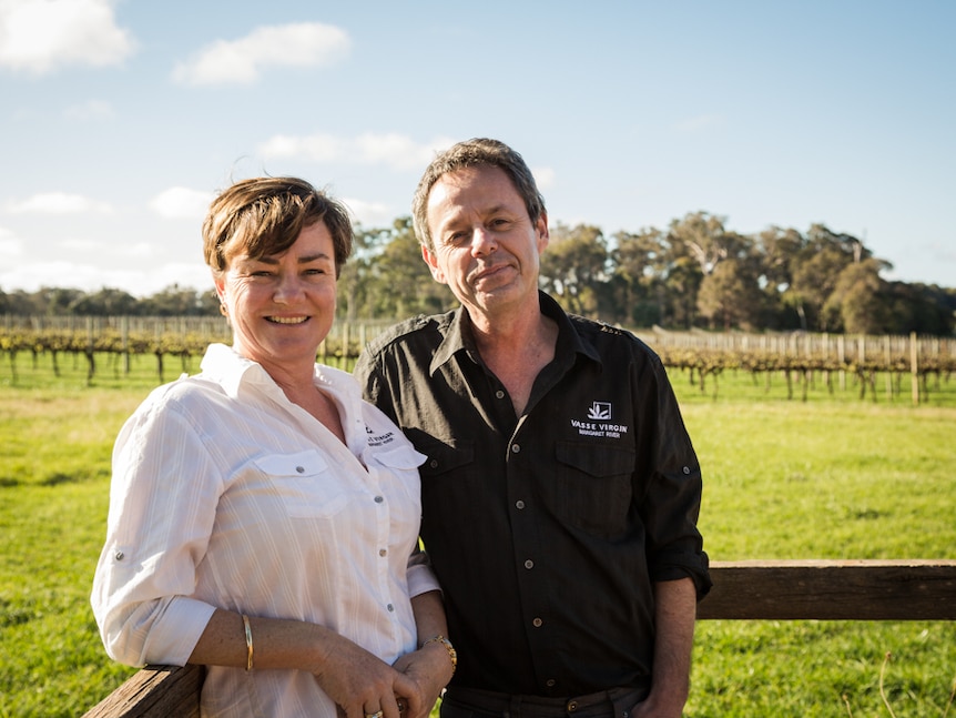 Edwina and Louis Scherini stand in winery