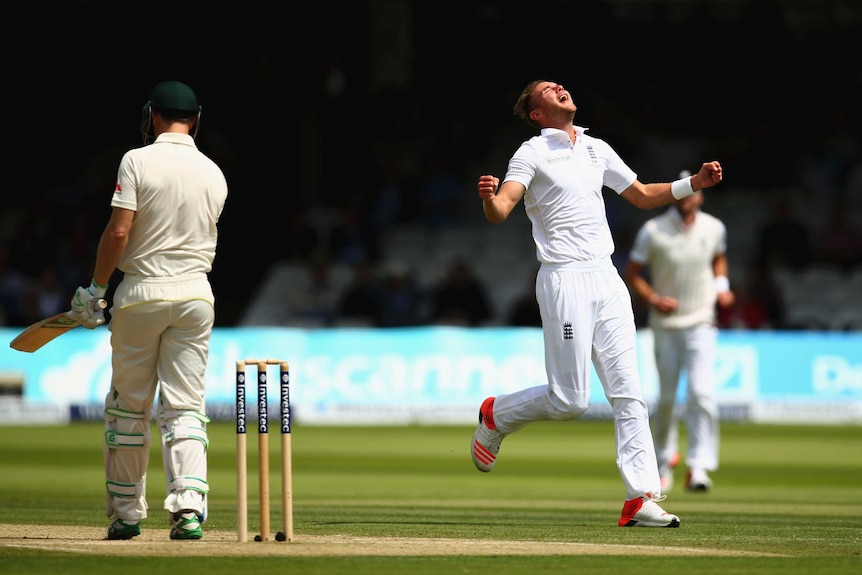 Stuart Broad celebrates after removing Adam Voges on day two of the second Ashes Test at Lord's