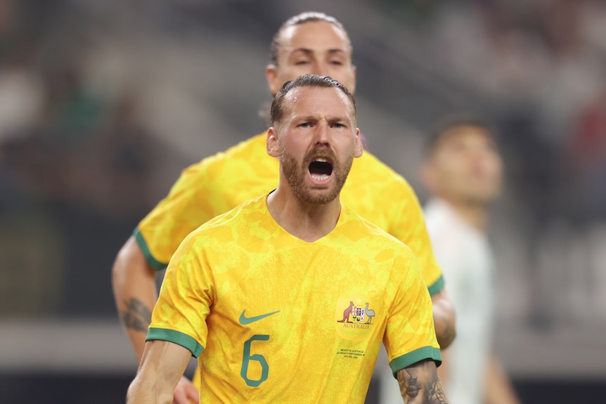 Martin Boyle shouts to celebrate a goal for the Socceroos against Mexico.