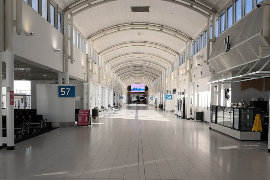 Photo of Sydney airport's empty terminal.