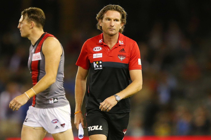 Hird leaves the field against the Demons