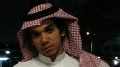 Junaid Thorne in Arab dress and headscarf