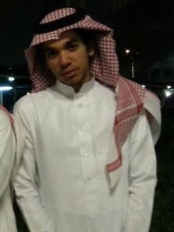 Junaid Thorne in Arab dress and headscarf