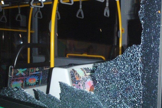 The shattered window of a Transperth bus after a rock was allegedly thrown at it.