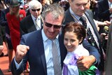 Prince of Penzance trainer Darren Weir and jockey Michelle Payne celebrate their Melbourne Cup win.
