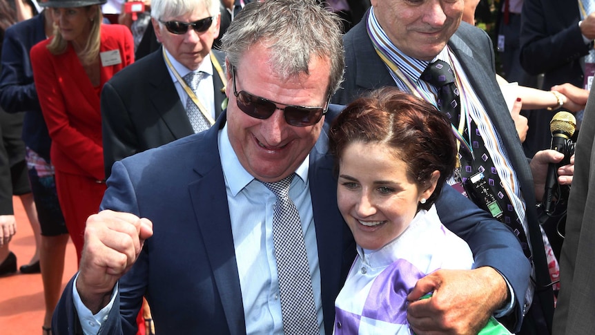 Prince of Penzance trainer Darren Weir and jockey Michelle Payne celebrate after 2015 Melbourne Cup.