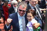 Prince of Penzance trainer Darren Weir and jockey Michelle Payne celebrate after winning the Melbourne Cup