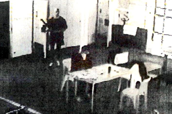 CCTV still of Matthew Johnson about to attack Carl Williams at Barwon Prison in April 2010.
