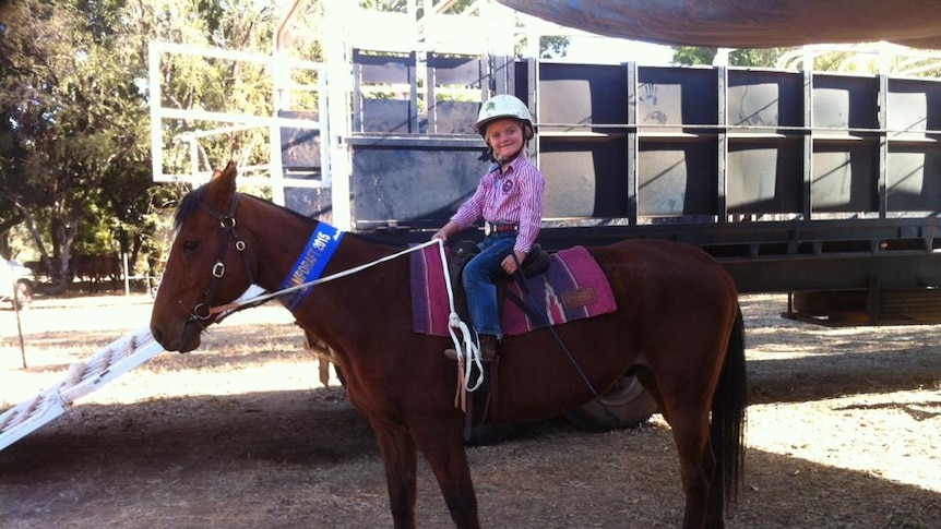 Lexi Daley on her winning horse 'Duke' at the Kununurra campdraft.