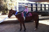 Lexi Daley on her winning horse 'Duke' at the Kununurra campdraft.