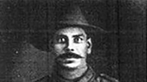 A black and white photo of William Allan Irwin in his uniform.