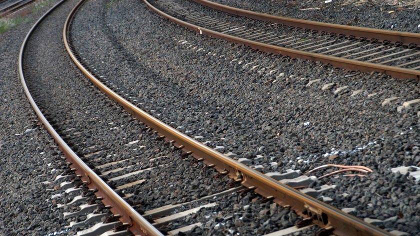 Train tracks stretching into the distance.