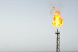 A flame burns at the Balal offshore oil platform